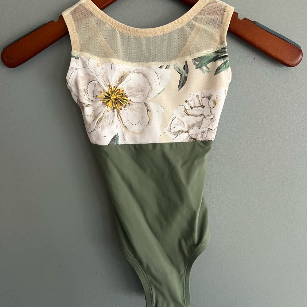 Lucky Leo brand floral top with sage green bottom.